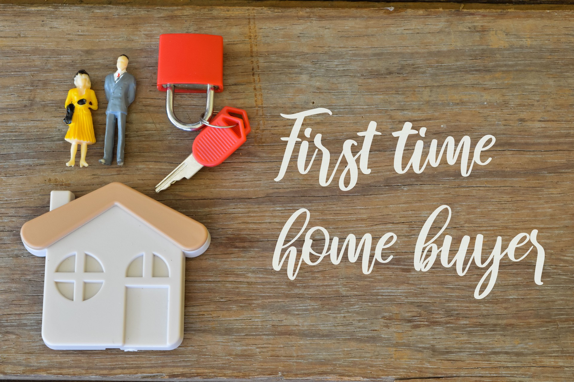 Wooden background written with FIRST TIME HOME BUYER.